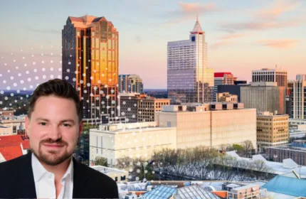 Raleigh skyline at sunset with downtown office buildings and a professional headshot of a Beacon Hill representative overlaid